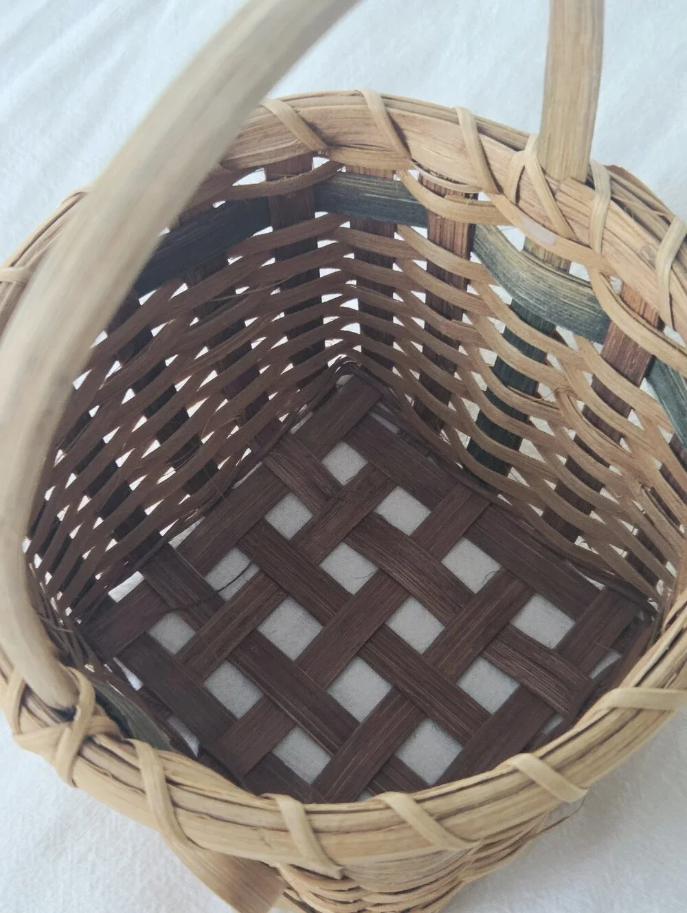 Vintage, Hand-Woven Basket Featuring A Unique Bow Detail And Green Accent